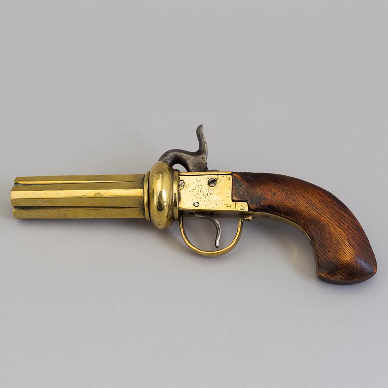 A second half of the 19th century four-barrel Swedish brass percussion revolver.