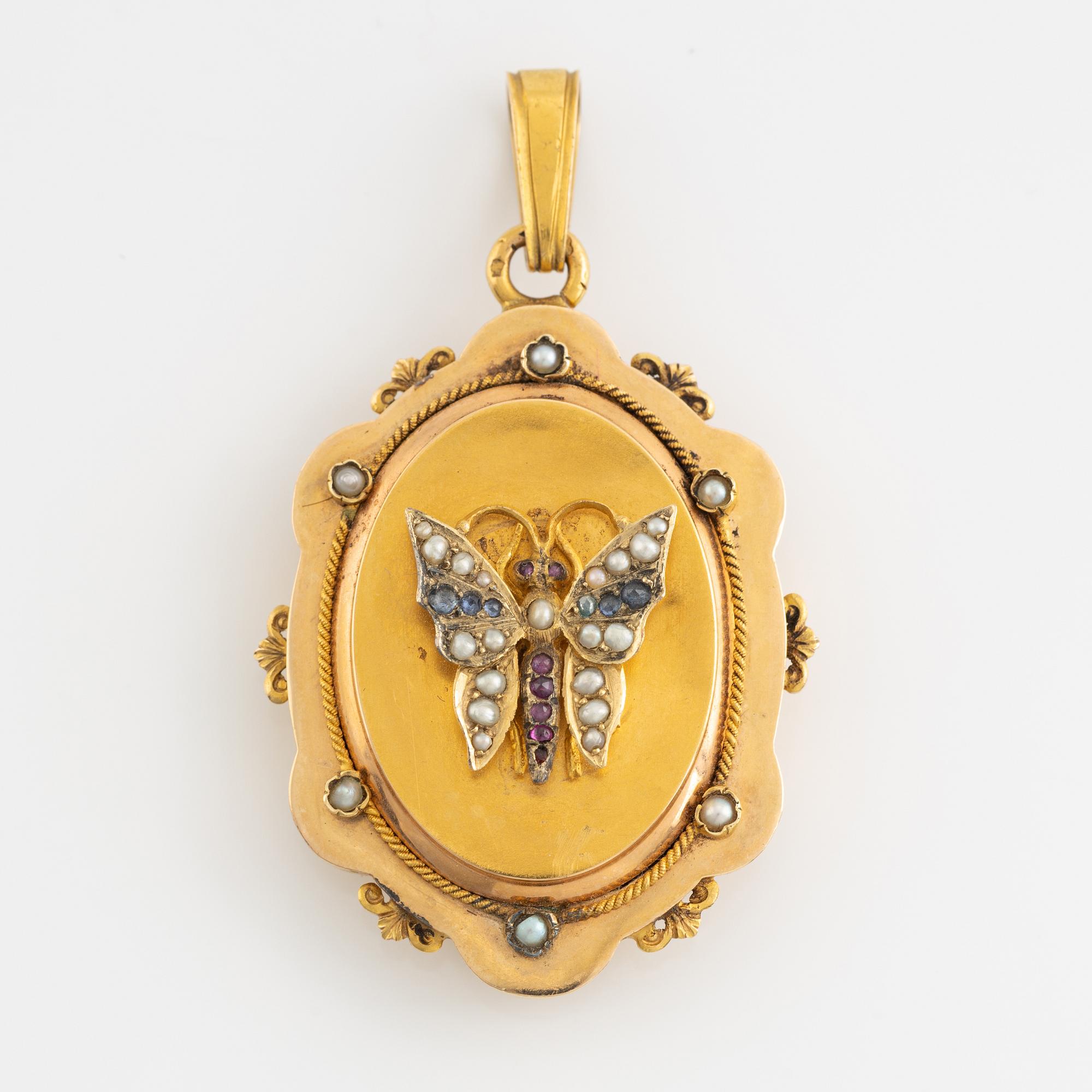 Locket with butterfly, with seed pearls, rubies and sapphires, 1800's.