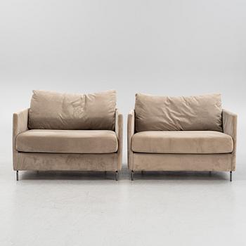 A pair of armchairs, 21st Century.