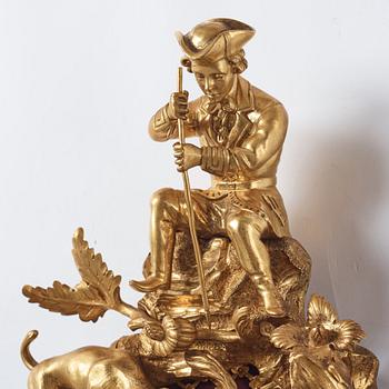 A Louis XV mid 18th century gilt bronze wall clock, "Chasse", in the style of J J de Saint Germain,