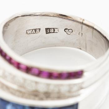 W.A. Bolin ring 18K vitguld med gammal- och åttkantslipade diamanter samt fasettslipade safirer och rubiner.
