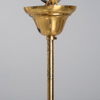 A 1950's glass and brass ceiling light.