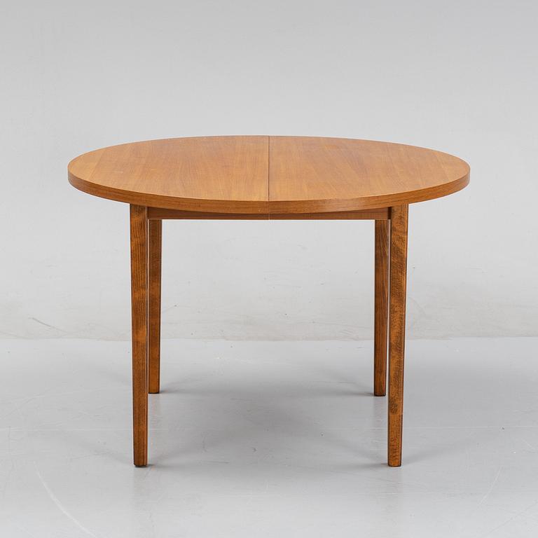 A teak dining table, second half of the 20th century.