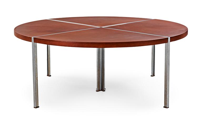 A Walter Knoll dining table with brown leather top, Germany.