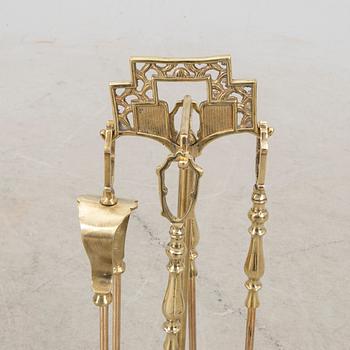 A late 20th century English brass fire tools.