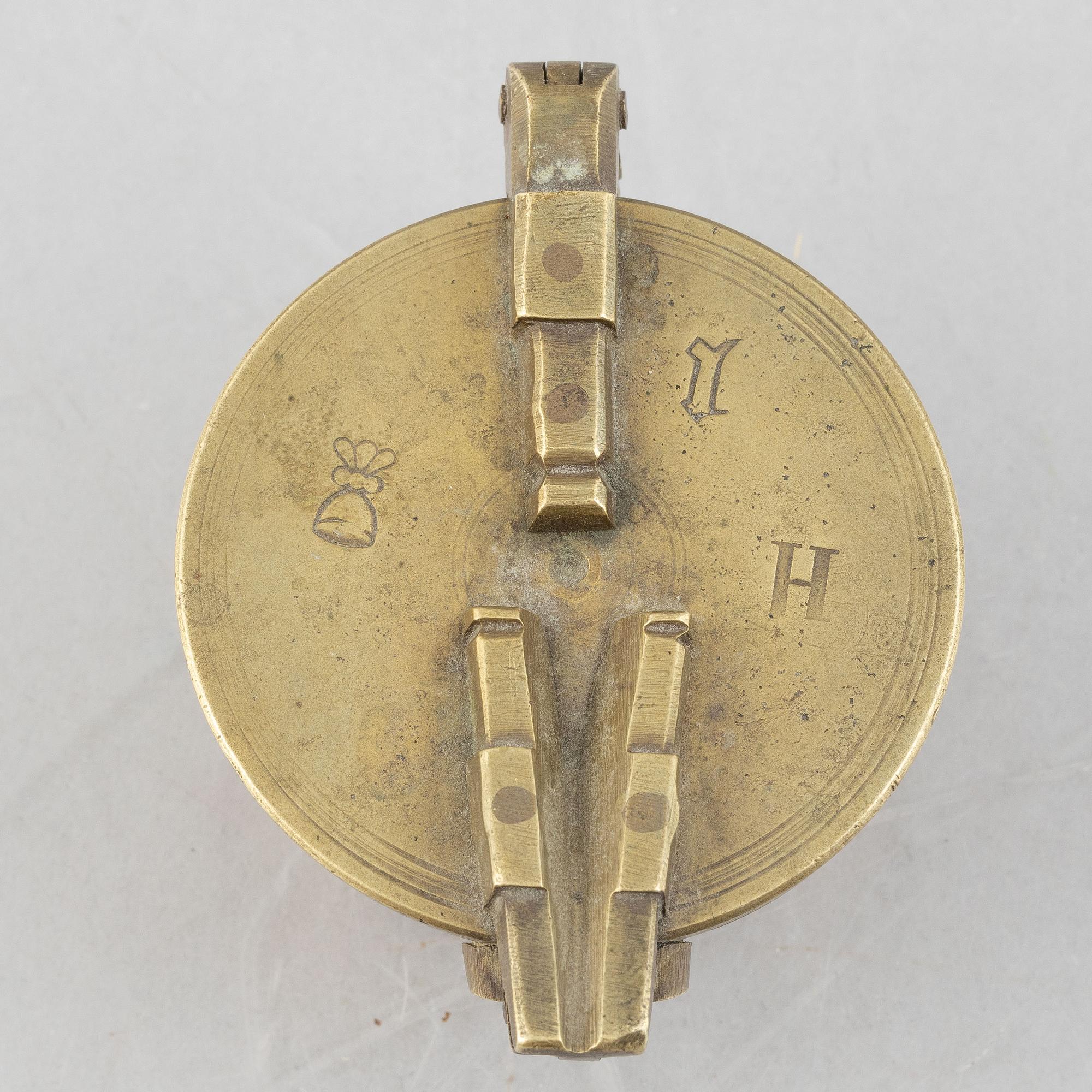 A set of three Nuremberg brass nested cup weights, one by Christoph or Johan Conrad Schön (masters 1746(1750).