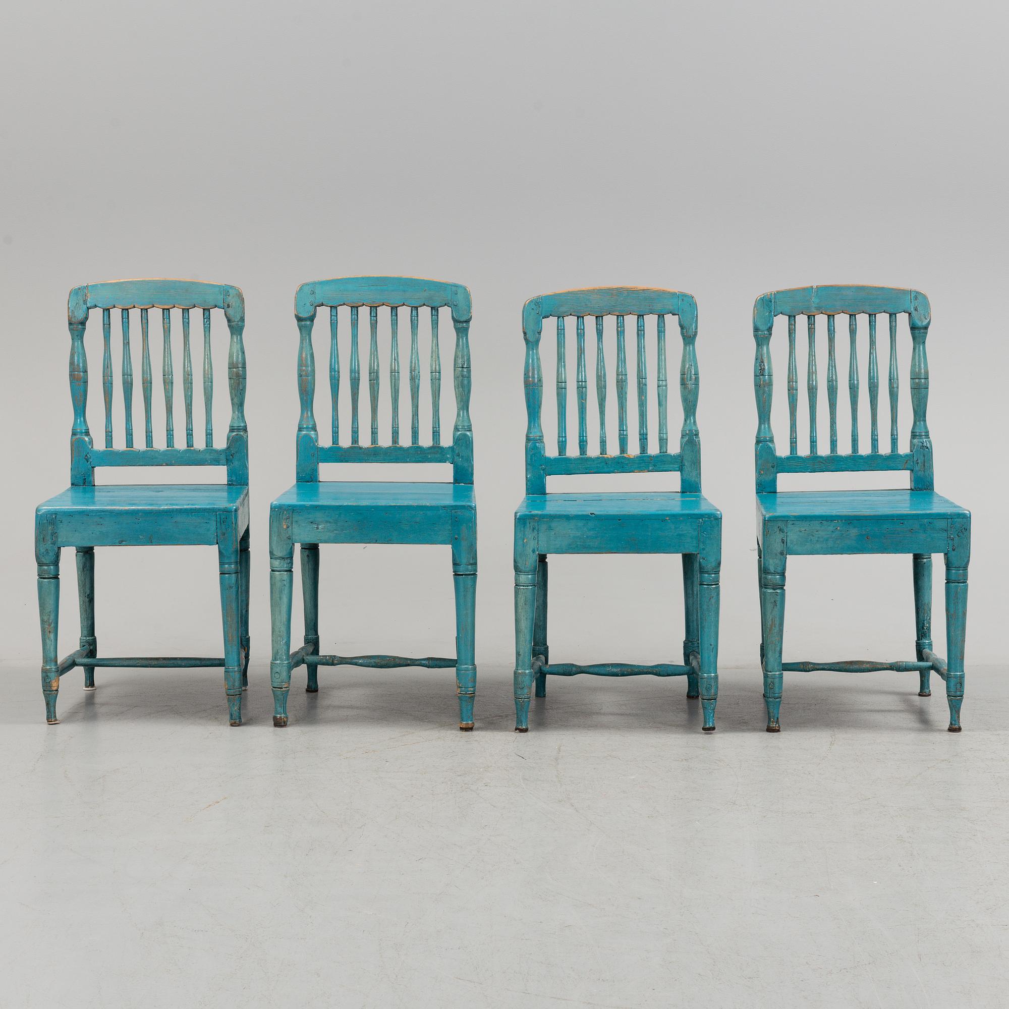 A set of four 19th century folk art chairs.