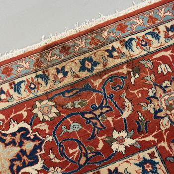 A old Esfahan carpet, around 299 x 210 cm.