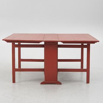 A gate leg table, 19th century.