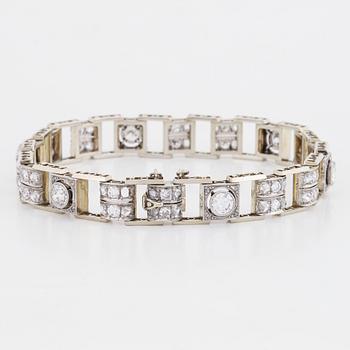 An 18K white gold bracelet set with old- and rose-cut diamonds.