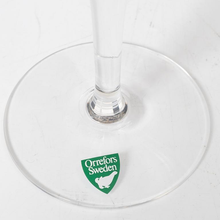 A set of 46 glass service parts, including 'Elixir Connoisseur' and Gunnar Cyrén, 'Optica', Orrefors.