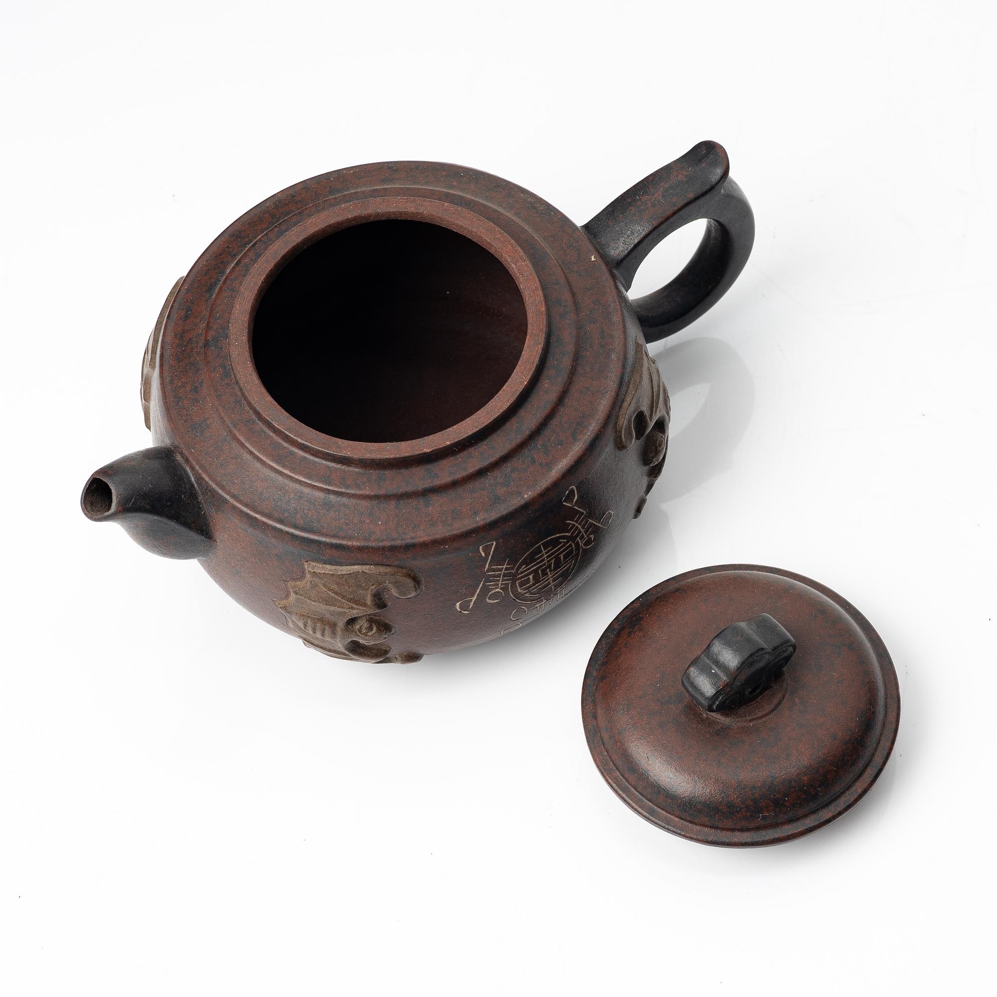 A 'bat' yixing teapot, China 1980s.