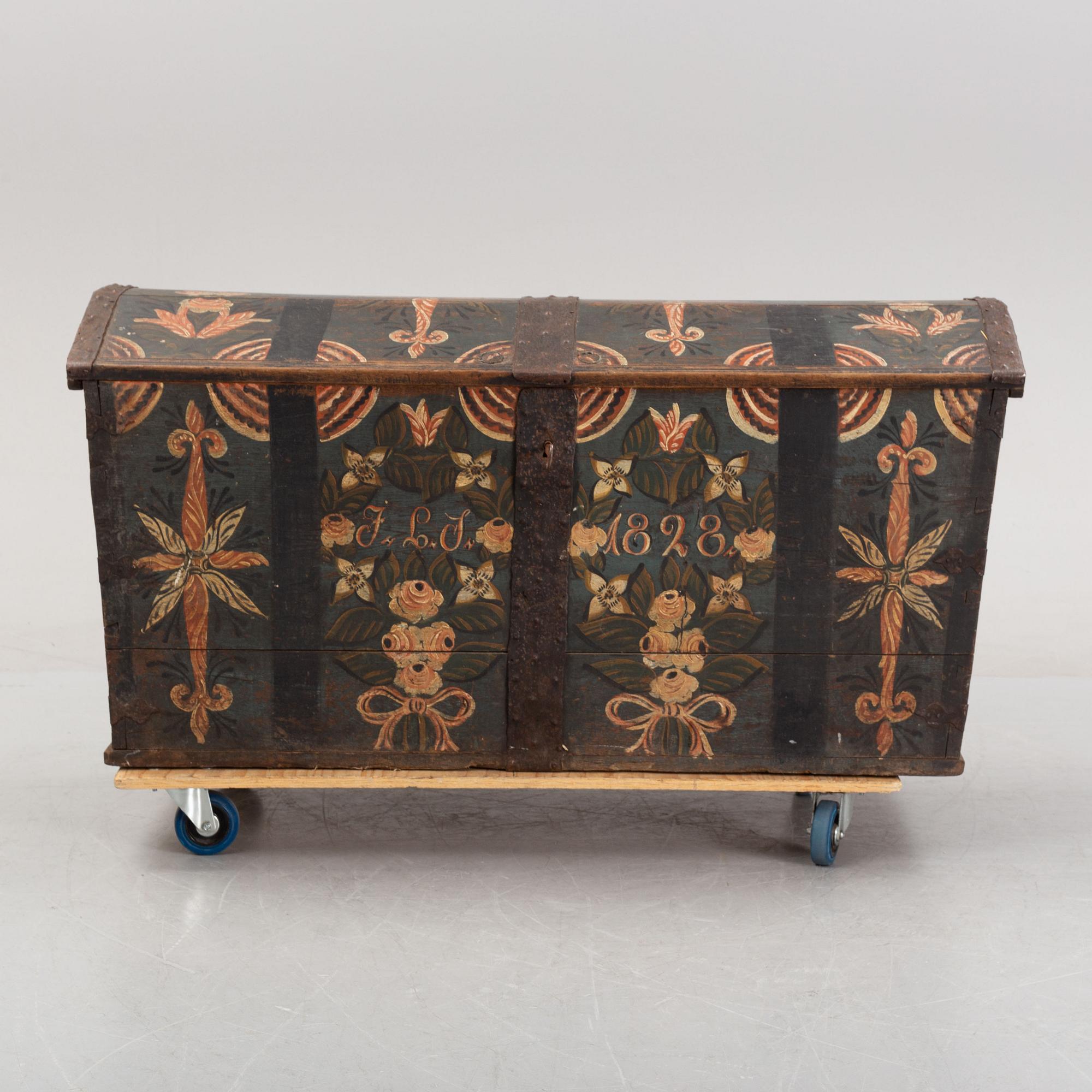 A swedish provincial oak chest, dated 1928.