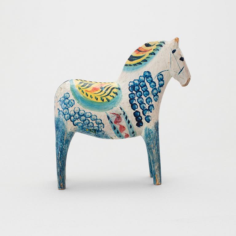 A painted folk art dala horse early 20th century.