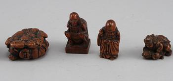NETSUKES, 8 st, trä, Japan, Meiji (1868-1912).