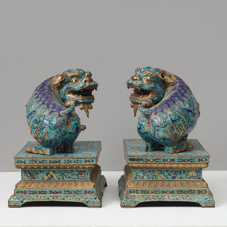 A large pair of cloisonné temple lions, Qing dynasty, 19th Century.