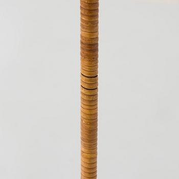 Paavo Tynell, a mid-20th century K10-10 floor lamp for Taito.