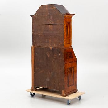 A Swedish late Baroque walnut marquetry writing cabinet.