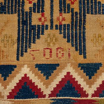 A BED COVER AND A FRAGMENT, flat weave, ca 214,5 x 117,5 cm  and ca  126 x 53 cm, Scania the 19th century.