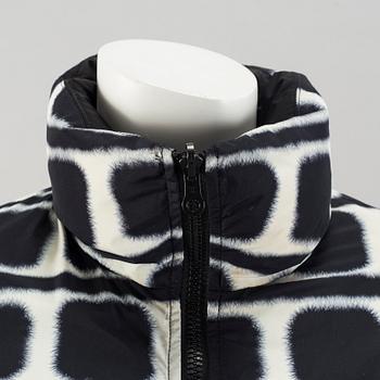 A reversibly down jacket by Chanel, autumn 2007.