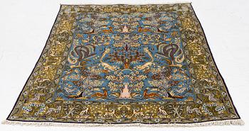 A Ghom figural rug, c. 202 x 132 cm.