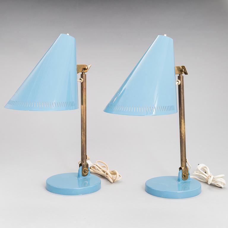 A pair of desk lamps by Paavo Tynell manufactured by Taito Oy.