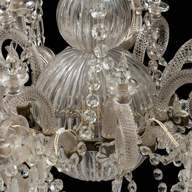 A 19th century chandelier with glass arms.