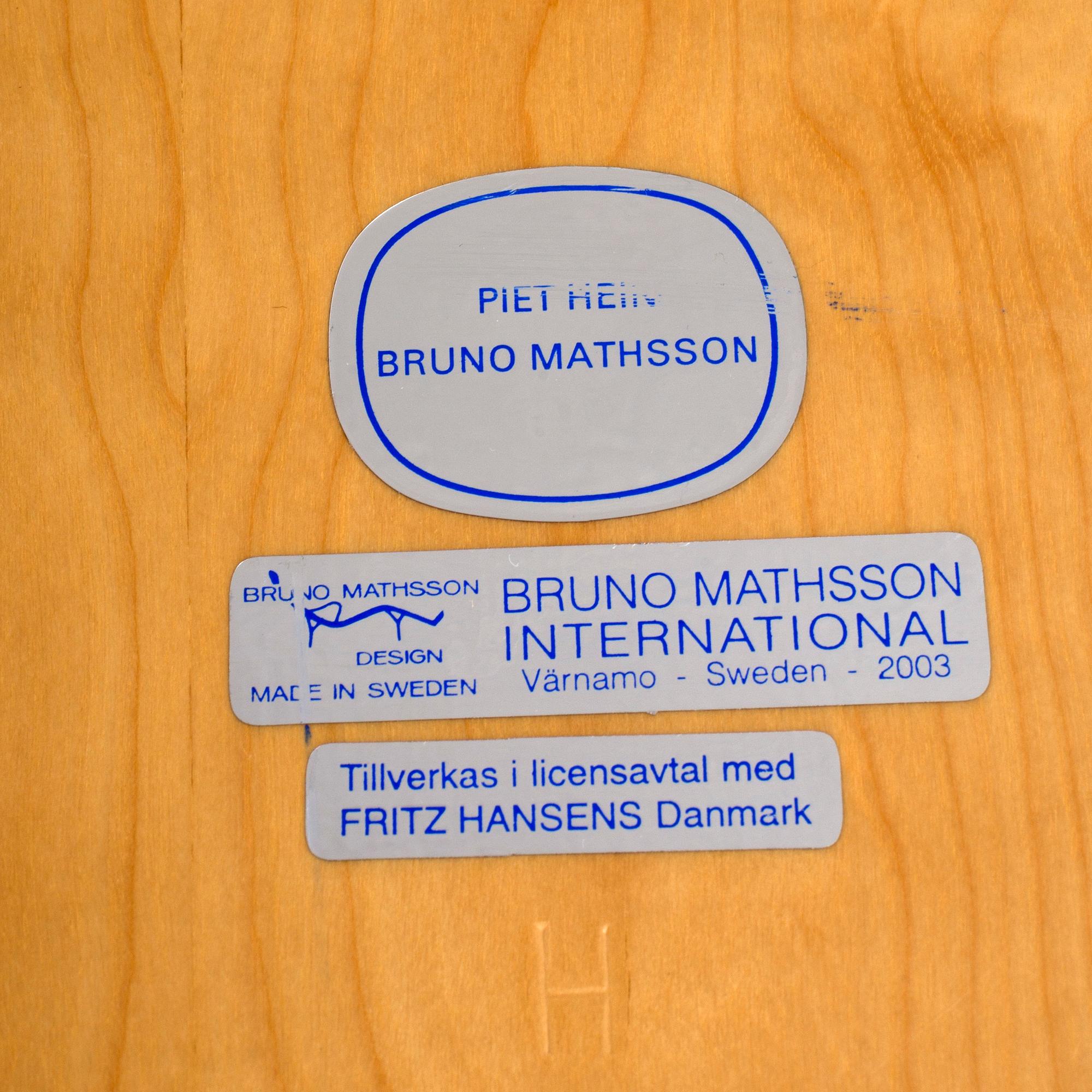 BRUNO MATHSSON AND PIET HIEN a 'Superelips' birch coffee table, 2003.