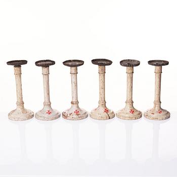 A set of six Empire wooden candlesticks, early 19th century.