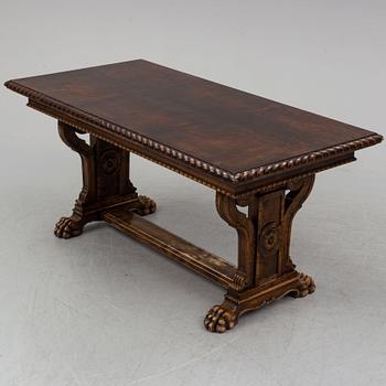 A mid 20th century baroque style dining table.