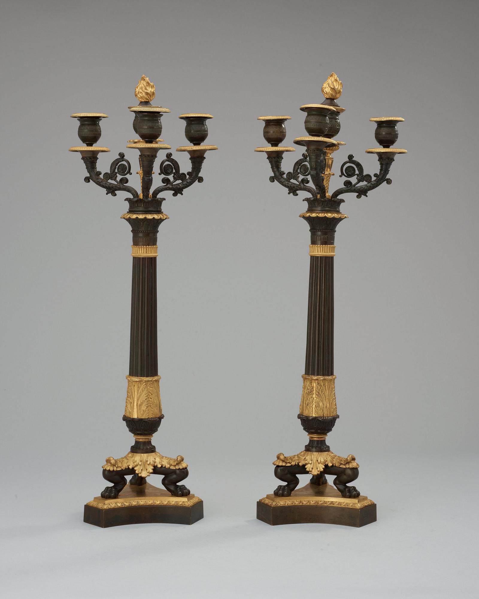 A pair of French Empire 19th century four-light candelabra.