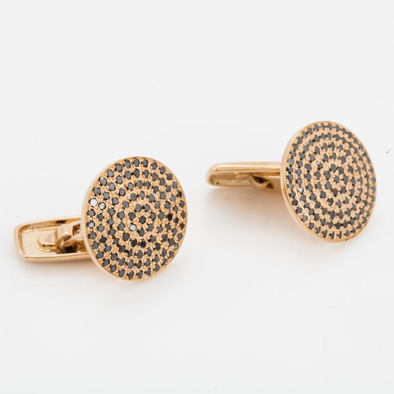 18K gold and black diamond cufflinks.