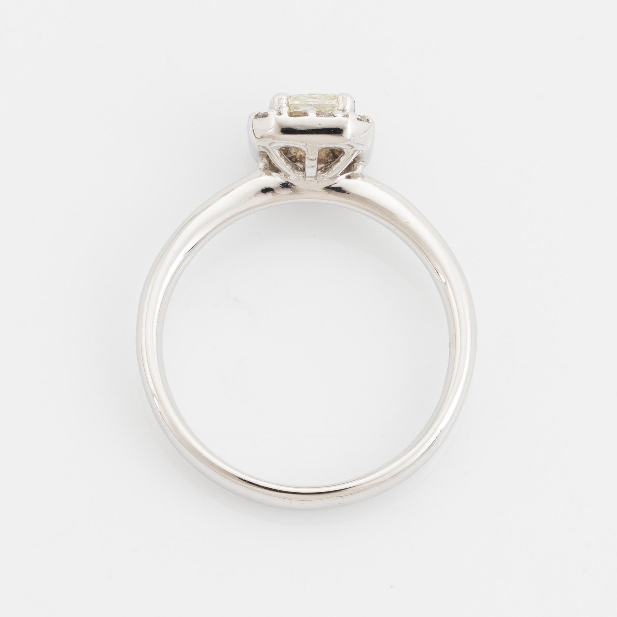 Radiant cut diamond and brilliant cut diamond ring.