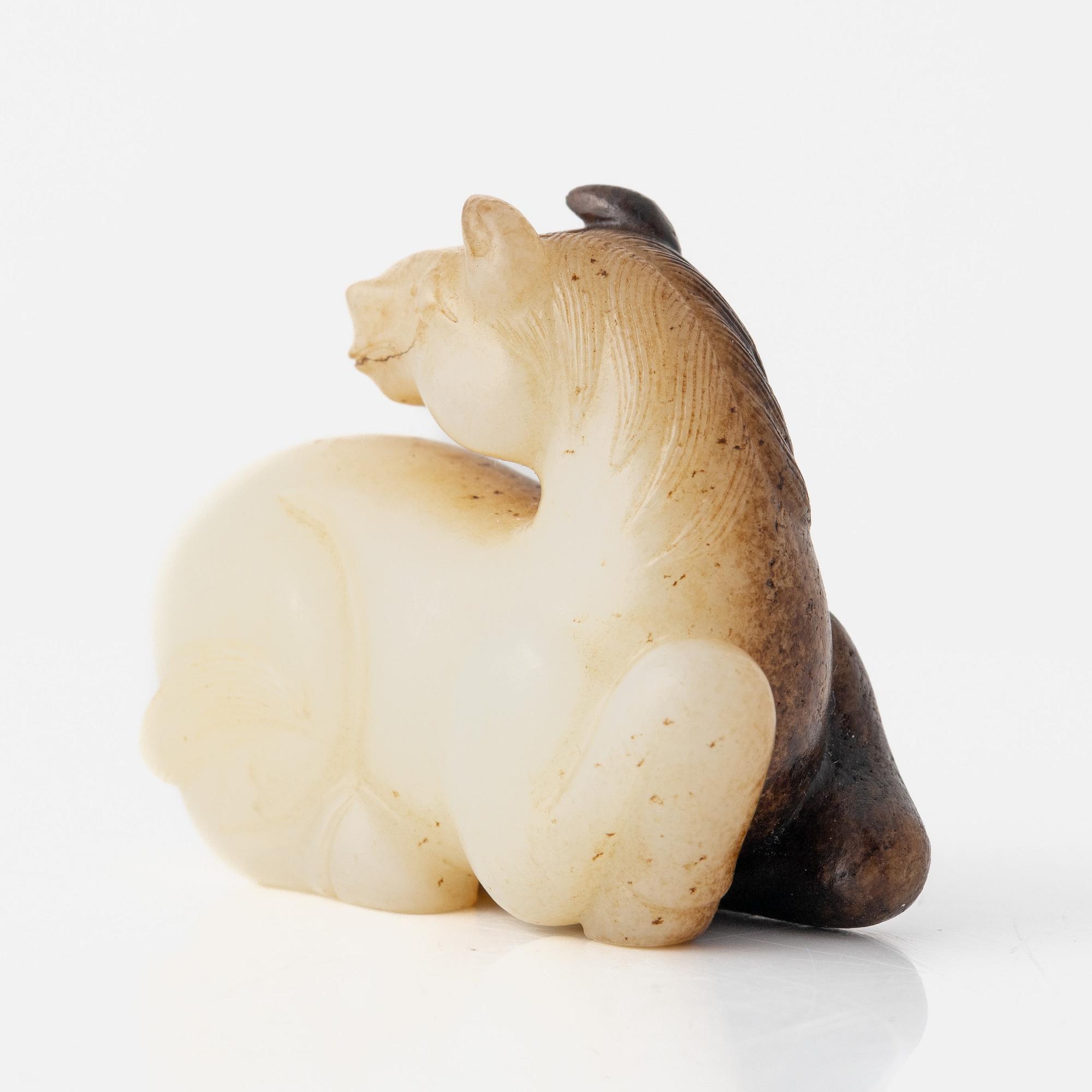 A nephrite sculpture of a horse, China, 20th Century.