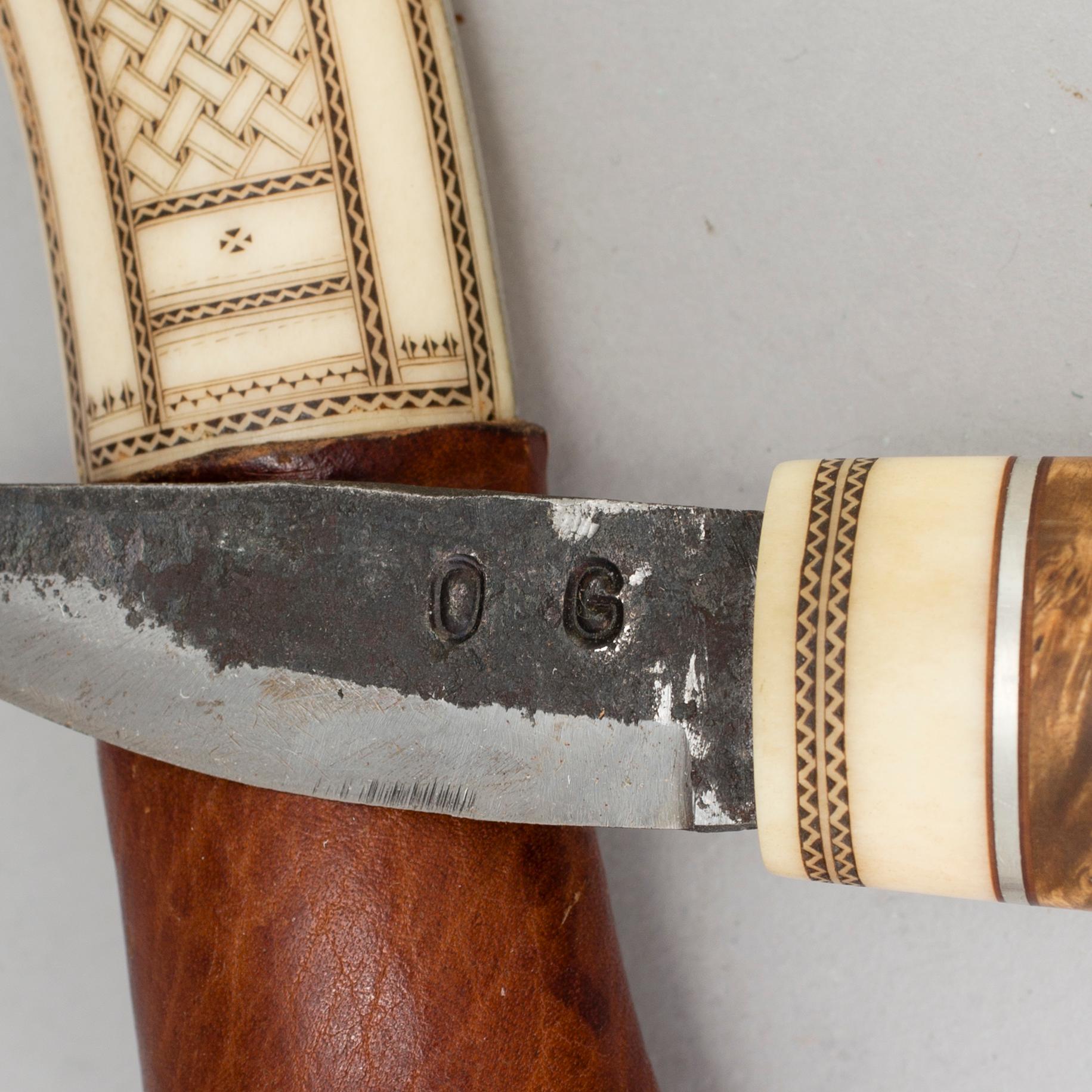 A traditional sami knife. Signed with unknown signature.