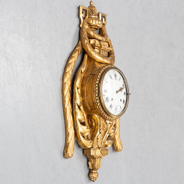 An 18th century Louis XV wall clock Jean-Petit L´Aine, Amsterdam.