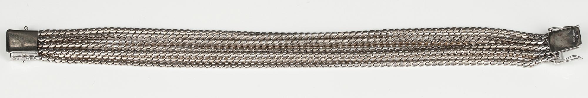 ARMBAND, 9-radigt. 18K vitguld. Mellaneuropa 1960-tal. Längd 19 cm, vikt 50 g.