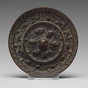 573. SPEGEL, brons. Tangdynastin (618-907).