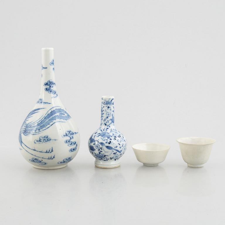 Two blue and white vases and two white glazed cups, China, late Qing dynasty and early 20th century.