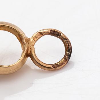 A 14K gold bracelet.