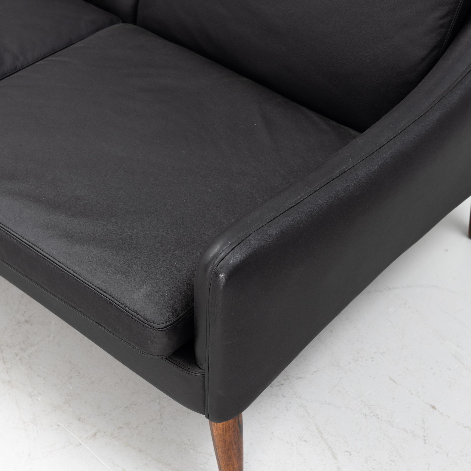Hans Olsen, a leather and rosewood sofa, C/S Møbler, Denmark, 1960's.