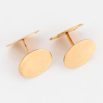 A pair of cufflinks, 18K gold, with monogram.