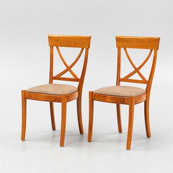A seven-piece Grange cherry wood and beech dining suite, France, late 20th Century.