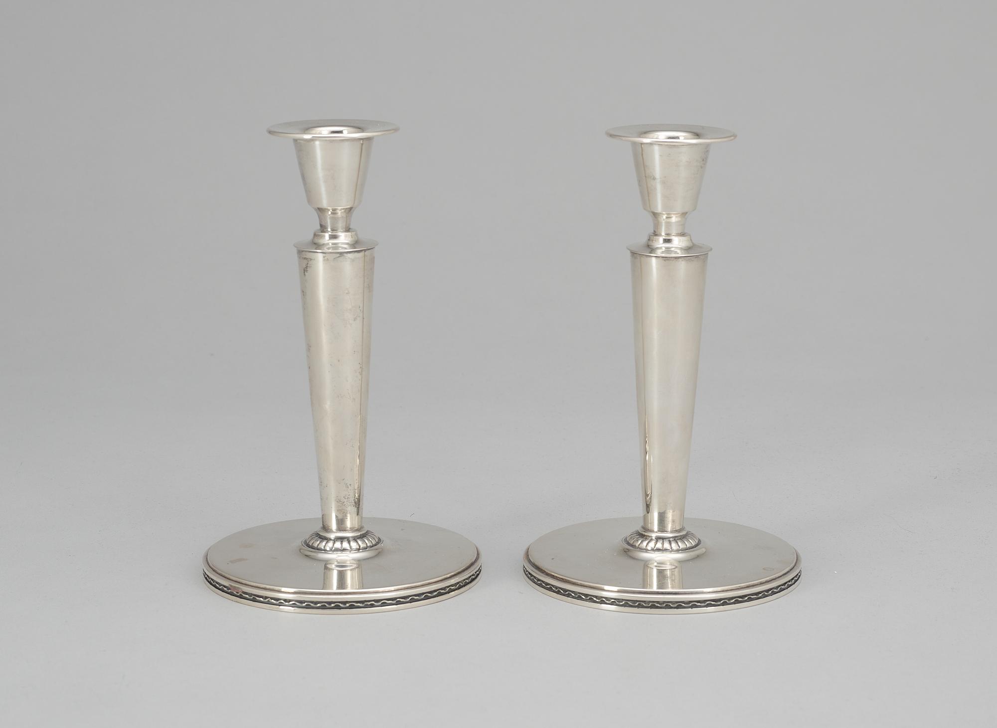 A pair of Eric Råström silver candelsticks by CG Råström, Stockholm 1948.