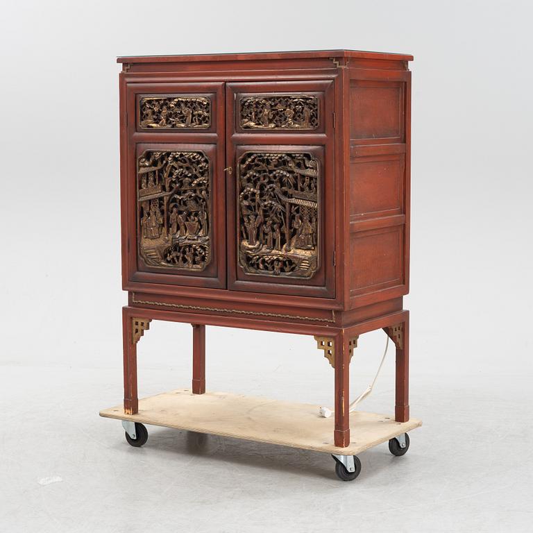 A bar cabinet, purchased in Tokyo around the 1950s. Partly built by late Qing dynasty panels.