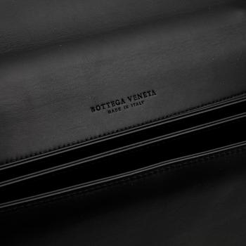 BOTTEGA VENETA, a black leather briefcase.