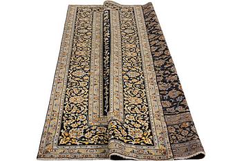 A carpet, Kashan, ca. 359 x 259 cm.