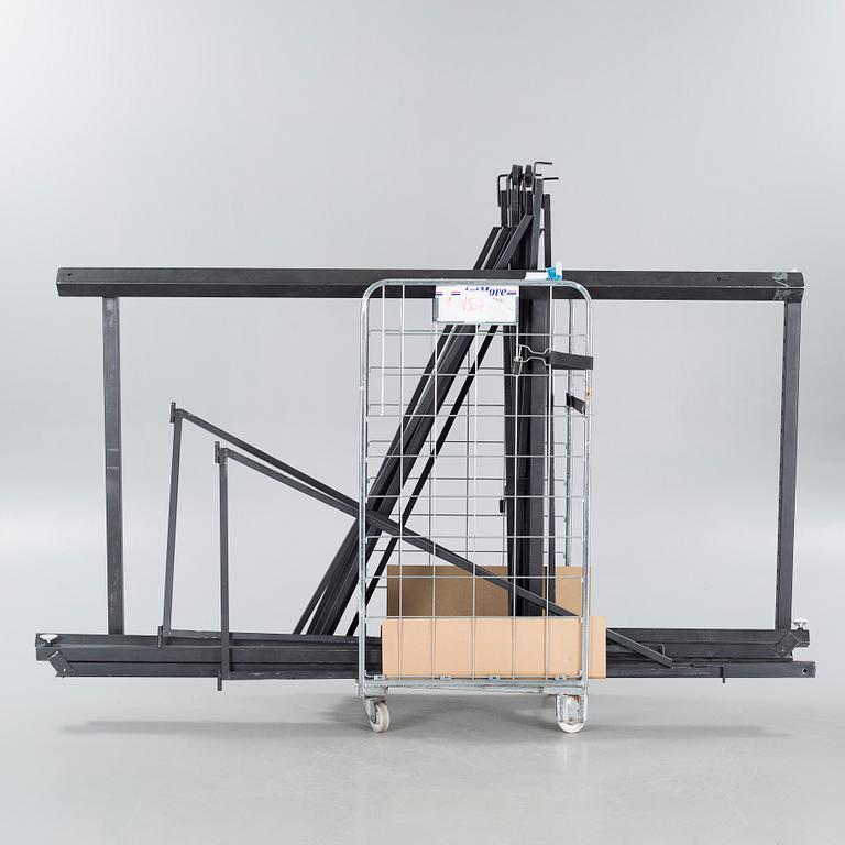 A 21st century showroom rug hanger.