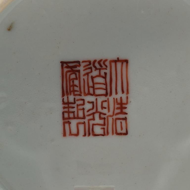 A famille rose bowl, late Qing dynasty, with Daoguangs sealmark in red.