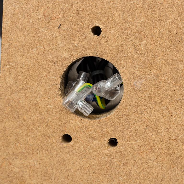 TOM DIXON, a pair of 'Base' wall light.